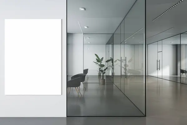 Front view on blank white poster with place for your logo on light wall background in stylish minimalistic style office with transparent walls, concrete floor and furniture. 3D rendering, mock up