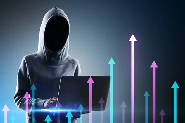 Hacker in hoodie using laptop with various growing arrows on gray background. Growth, hacking, future and performance concept