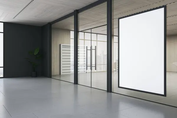 Perspective view on blank white poster in black frame with place for advertising text or logo on glass partition in spacious office with concrete floor and dark wall background. 3D rendering, mock up