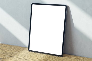 Boş beyaz dijital tablet ekran perspektifine perspektif bakış veya ahşap yüzey üzerine tasarım ve günışığı duvarı arka planı, reklamcılık ve pazarlama kavramı. 3B görüntüleme, modelleme