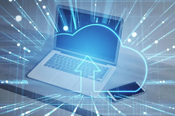 Laptop with abstract glowing cloud and digital blue mesh hologram on blurry desk background. Safety and secure concept. Double exposure