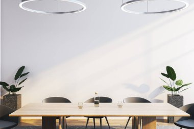 Modern bir iç mekanda siyah sandalyeli ahşap yemek masası, zarif ışıklandırma ve beyaz bir duvara karşı saksıda bitkiler. Rahat ve şık bir yer. 3B Hazırlama.