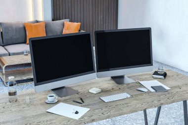Ahşap bir masada iki boş masaüstü ekranı olan çağdaş ofis kurulumu, şık bir iç mekanda ofis malzemeleri ve bir kahve fincanı bulunuyor. 3B Hazırlama.