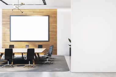 Ahşap duvarında boş çerçevesi olan çağdaş toplantı odası, beton zeminde modern mobilyalar, temiz şirket tasarımı. 3B Hazırlama