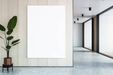 Ahşap duvarda boş tuval modeli sergileniyor. Temiz modern ofis içinde beton zemin ve saksı bitkisi, tasarım sergisi konsepti. 3B Hazırlama