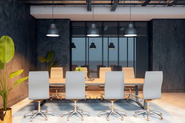 Hafif ahşap masa, ergonomik sandalyeler, asgari beton arka planda kolye ışıkları ve bitkilerin bulunduğu modern ofis toplantı odasının şık bir iç mekanı. 3B Hazırlama