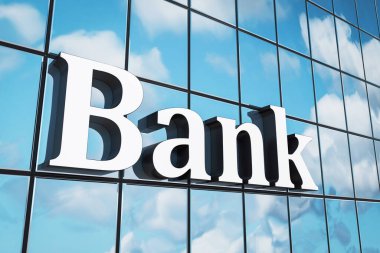 Binanın üzerinde bir banka tabelası var. Tabela beyaz ve üzerinde 