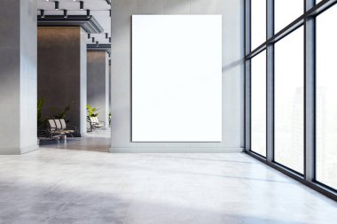 Modern ofis koridorunda, büyük pencereli ve şehir manzaralı gri bir duvarda dikey boş poster modeli.