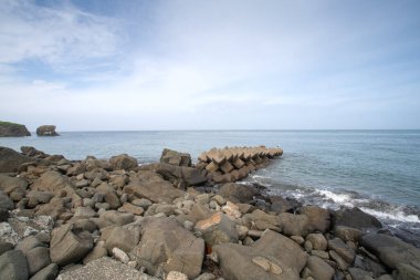 Nosappu Burnu, Hokkaido 'nun ve Japonya' nın en doğu noktası, Pasifik Okyanusu 'ndan gelen suların Okhotsk, Nemuro, Hokkaido, Japonya ile buluştuğu yer.