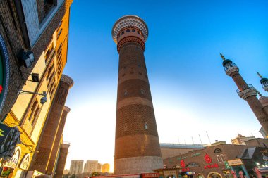 Urumqi, Xinjiang, China - June 21, 2024 - Scene of International Grand Bazaar Xinjiang, an Islamic bazaar, the largest bazaar in the world, combining Islamic culture, architecture, ethnic commerce and tourism clipart