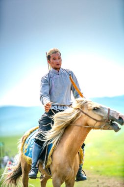 Ulaanbaatar, Mongolia - August 4, 2024 - Archery with horse galloping, one of the sport games in Danshig Naadam and Khuree Tsam festival, the ancient religious and cultural festival of Mongolia clipart