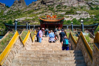 Terelj, Mongolia - August 12, 2024 - Scene of Aryabal Meditation Temple, tibetan styled temple belongs to the Kalachakra sect of Buddhism, located in Gorkhi-Terelj National Park clipart