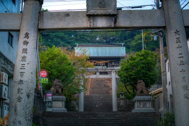 Nagasaki, Japan - November 14, 2024 - Scene of Suwa Shrine, the major Shinto shrine of Nagasaki located in the northern part of the city, on the slopes of Mount Tamazono clipart