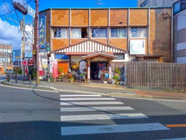 Miyazaki, Kyushu, Japan - November 17, 2024 - Street view of the town on the way to Takachiho Gorge clipart