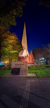 Kagoshima, Kyushu, Japan - November 18, 2024 - Cityscape of Central Kagoshima with many Japanese historic statue on side streets clipart