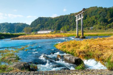 Harajiri Waterfall on Ono River in Ogata Town, referred to as Niagara Falls of East by appearance formed from pyroclastic flows of Mount Aso eruption, Bungo-Ono, Oita, Kyushu, Japan clipart