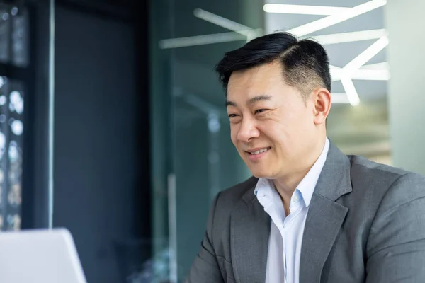Closeup Cheerful Successful Businessman Smiling Looking Laptop Screen Successful Asian — Stock Photo, Image