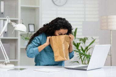 A young woman experiences sudden nausea at her office desk, possibly in need of medical attention or support. clipart