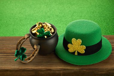 Saint Patricks Day. Pot full of Gold, Green Hat and Shamrock.