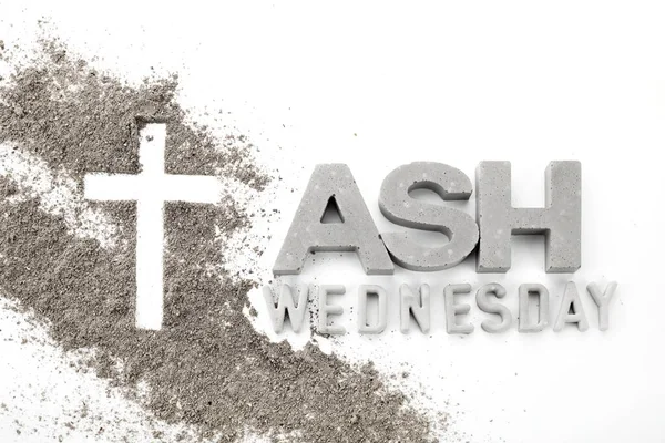 Ash wednesday, crucifix made of ash, dust as christian religion. Lent beginning.