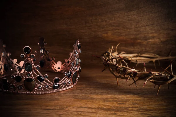 Crown Of Thorns with Crown Of on wooden background. The death and victory of Jesus Christ