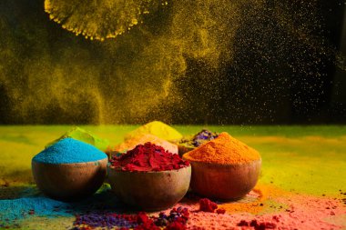 Colorful traditional Holi powder in bowls. Happy Holi. Concept Indian color festival