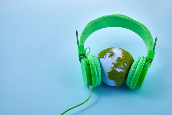 World Music Day Concept Stereo Headphone Globe Blue Background — Stock Photo, Image