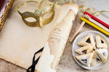 Scroll of Esther, hamans ears cookies.and Purim Festival objects. clipart