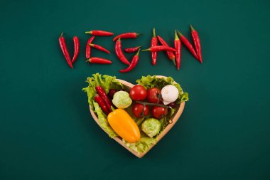 Ocak ayında vejetaryen diyet ayına Veganay deniyor. Kırmızı biberden yapılmış vejetaryen kelimesi.