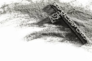 A cross made of ash representing Ash Wednesday, symbolic and spiritual in monochrome. clipart