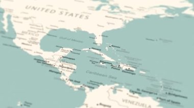 Dünya haritasında Küba. Pürüzsüz harita dönüşü. 4K canlandırması.