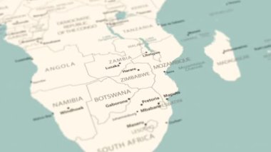 Dünya haritasında Zimbabwe. Pürüzsüz harita dönüşü. 4K canlandırması.