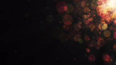 Renkli bulanık noktalar bokeh. Karanlık arka planda bulanık noktalar var. 4k soyut arkaplan. Kusursuz döngü.