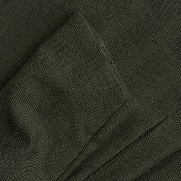 ダークグリーンのチェック柄のテキスタイルの背景プリンス ウェールズの背景がクローズアップ — ストック写真
