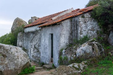 An old chapel building with a red tiled roof on St. Blaise hill near Nazare