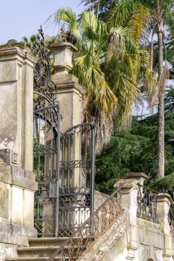 Ancient gate in the botanical garden of the University of Coimbra, Portugal