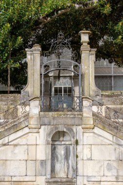 Ancient gate in the botanical garden of the University of Coimbra, Portugal