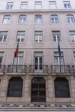 Facade with closed metal doors of the Bank of Portugal in Lisbon