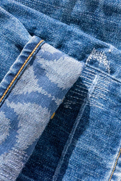 Calça Jeans Azul Com Padrões Sobre Punhos Costuras Decorativas Fundo — Fotografia de Stock