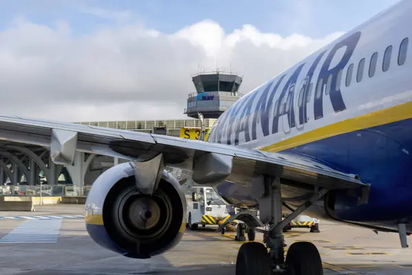 stock image 3 January - Porto, Portugal: White-blue-yellow Ryanair plane before takeoff close up against the sky
