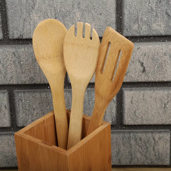 Wooden Bamboo Utensil Holder, bamboo kitchen utensils, Bamboo Utensil Holder, Garden Salad, Bamboo Salad Set, close-up and concept shot. e-commerce photos, free space for writing,