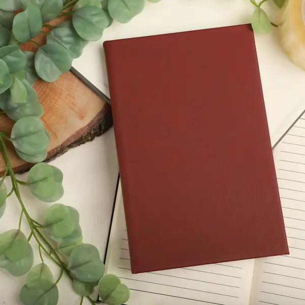 Leather Journals and Notebooks in different colors. Concept shot, top view. Custom background Journals and Notebooks view. Leather Sketchbook. Space Blank for text