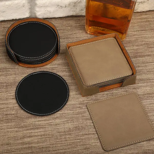 Leather table mats in different colors. Concept shot, top view. Custom background view of leather table coaster. Stitched and leather table coaster.
