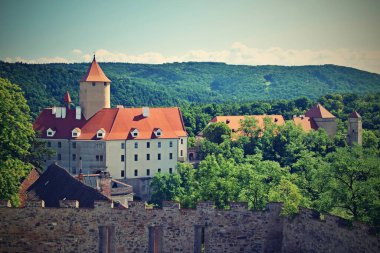 Beautiful old castle Veveri. Landscape with water on the Brno dam during summer holidays on a sunny day. Czech Republic - Brno.