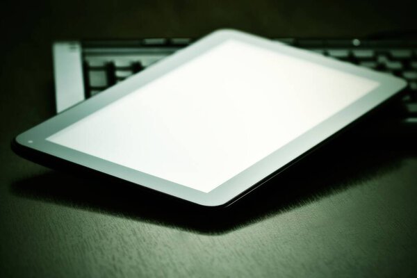 Modern digital tablet on black background