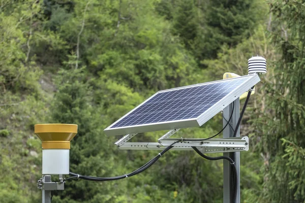 Solar panel with sensors. Forest area.