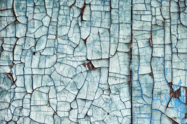 Uzun süreli güneş ışığına maruz kalmaktan çatlamış. Boyama dokusu                           