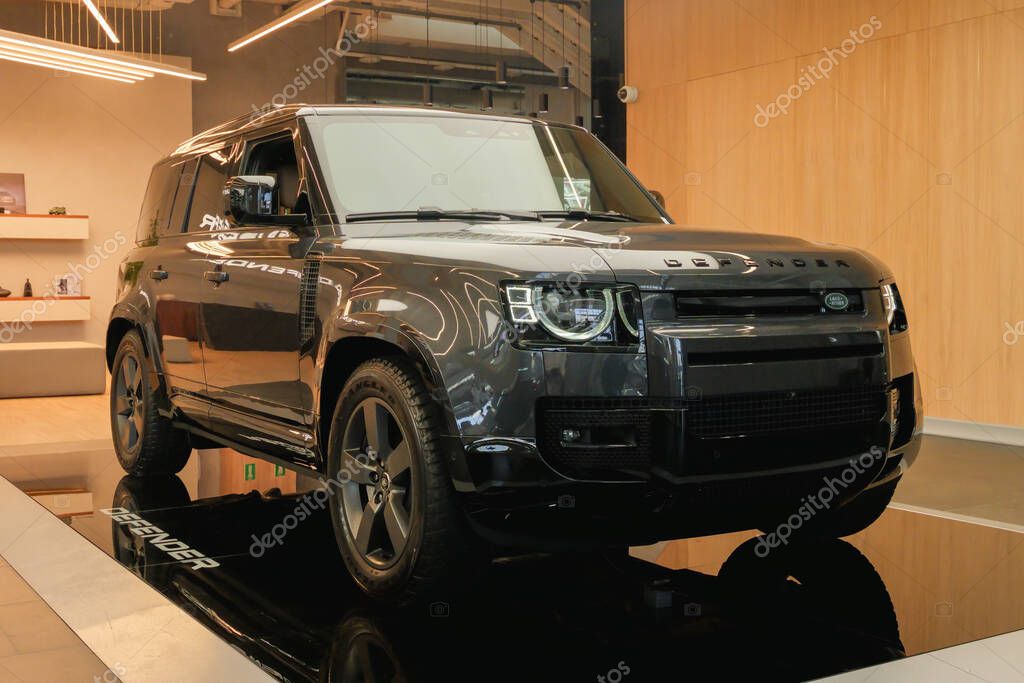 Almaty, Kazakhstan - March 13, 2025: Land Rover Defender 110 in the showroom. British car manufacturer