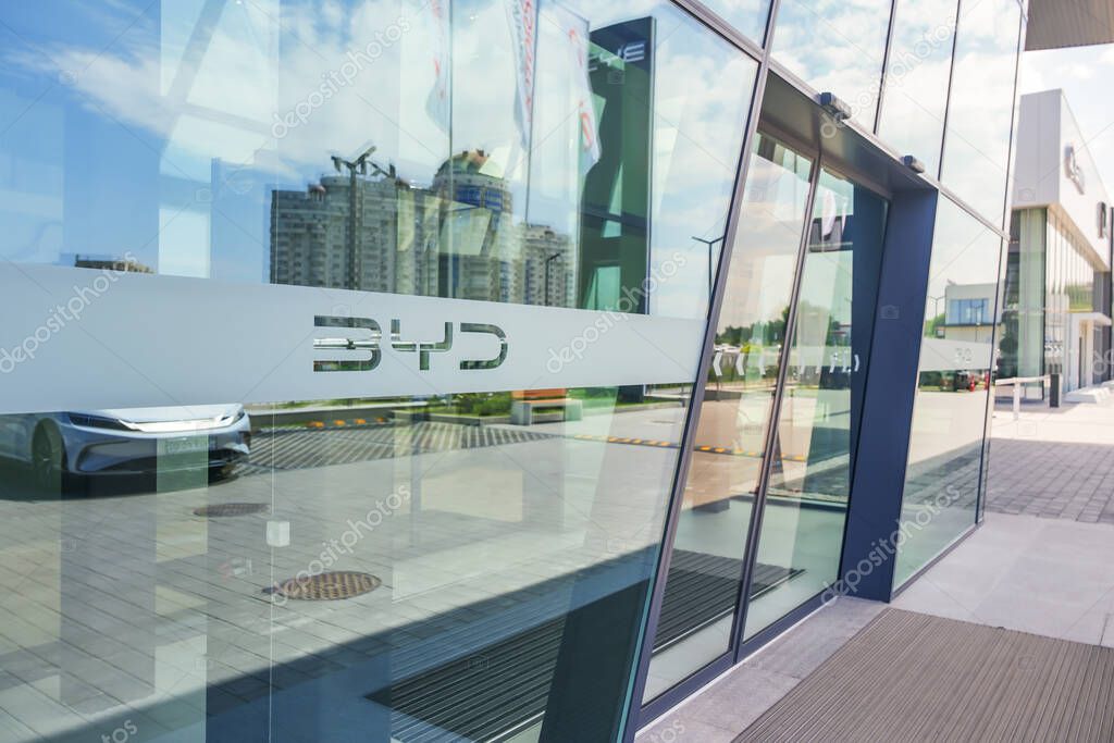 Almaty, Kazakhstan - May 29, 2025: Byd logo near the showroom entrance. Chinese automaker