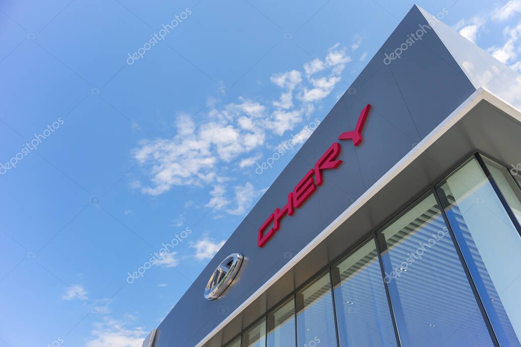 Almaty, Kazakhstan - May 29, 2025: Chery logo on the car dealership building. Chinese automobile manufacturing company